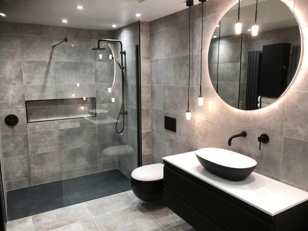 Rénovation économique Style contemporain Rénovation artisanale Salle de bain vintage Design intérieur Salle de bain en marbre Revêtement mural Aménagement espace Solutions de rangement Décoration salle de bain